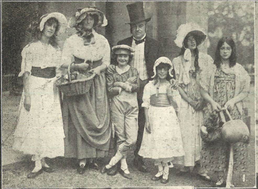 'Mr. Lyn Rainger and Mrs. Leeson, as Mr. and Mrs. Harris with their family'<br><small><i>Cheltenham Chronicle and Gloucestershire Graphic</i> 2 October 1920</small>