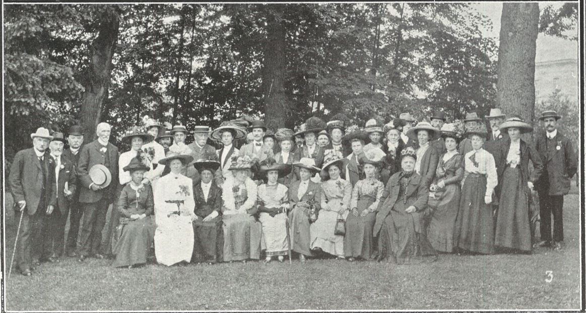 Committee members, stall-holders, and leaders of the Liberal Party<br>'Mrs Parsons, who has left Cheltenham, is seated in the centre, in dark dress'<br>Well, that pins her down, then<br><small><i>Cheltenham Chronicle and Gloucestershire Graphic</i> 22 June 1912</small>