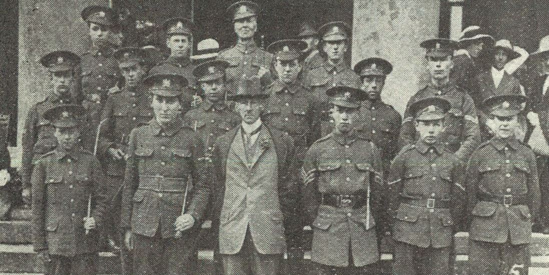 In case we forget there's a war on: 'Capt. Rev. R. H. M. Bouth with some of his cadets'<br><small><i>Cheltenham Chronicle and Gloucestershire Graphic</i> 29 June 1918</small>