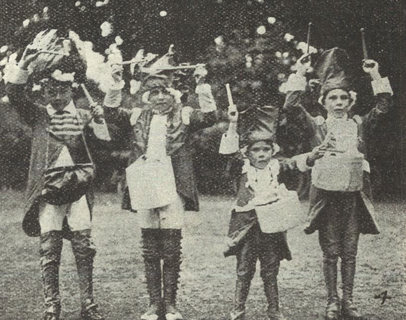 'Four drummer boys as tulips' (as they do)<br><small><i>Cheltenham Chronicle and Gloucestershire Graphic</i> 6 July 1918</small>