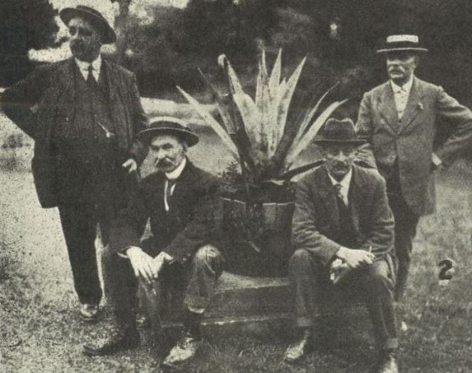 'The four promoters - Messrs Mullins, Harman, Slatter, and Dimond' (the microphone is in the plant)<br><small><i>Cheltenham Chronicle and Gloucestershire Graphic</i> 9 July 1919</small>