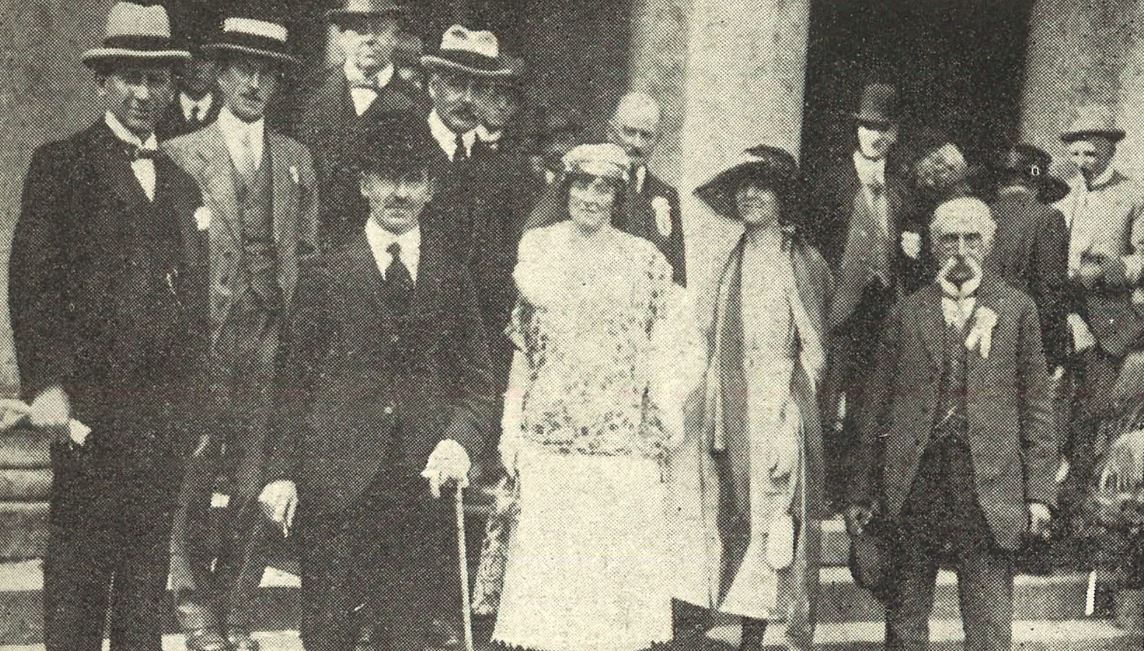 'The General Secretary, President and his wife, with Messrs. Welstead, Whitbread, Midwinter,<br>and Lamb (of Cheltenham) on the steps of the Pump Room', at the Chamber of Trade garden party<br><small><i>Cheltenham Chronicle and Gloucestershire Graphic</i> 28 May 1921</small>